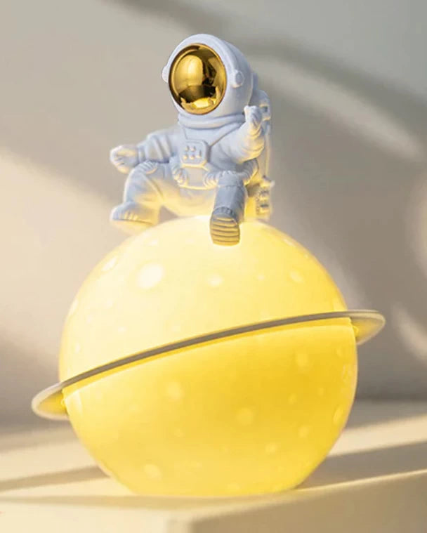 Astro Sitting on a Moon