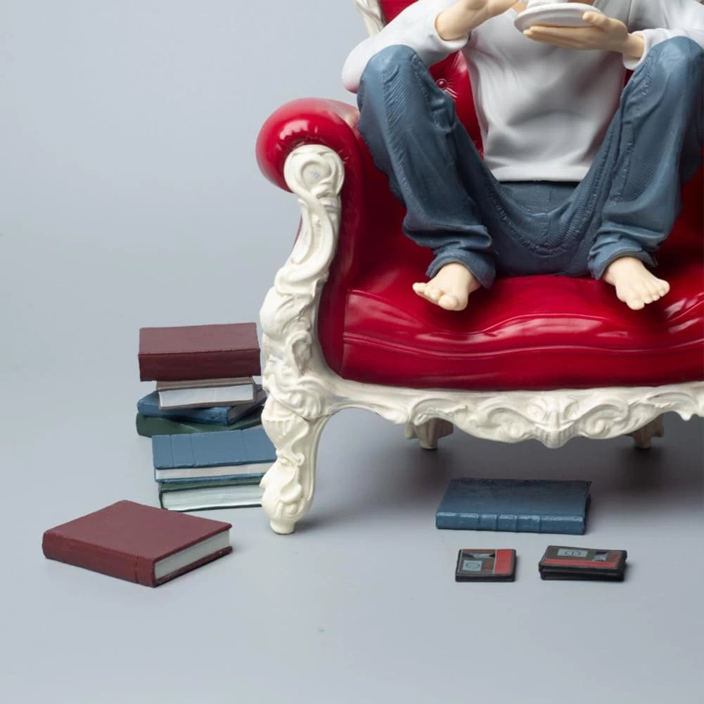 L on sofa with tea cup - Death Note
