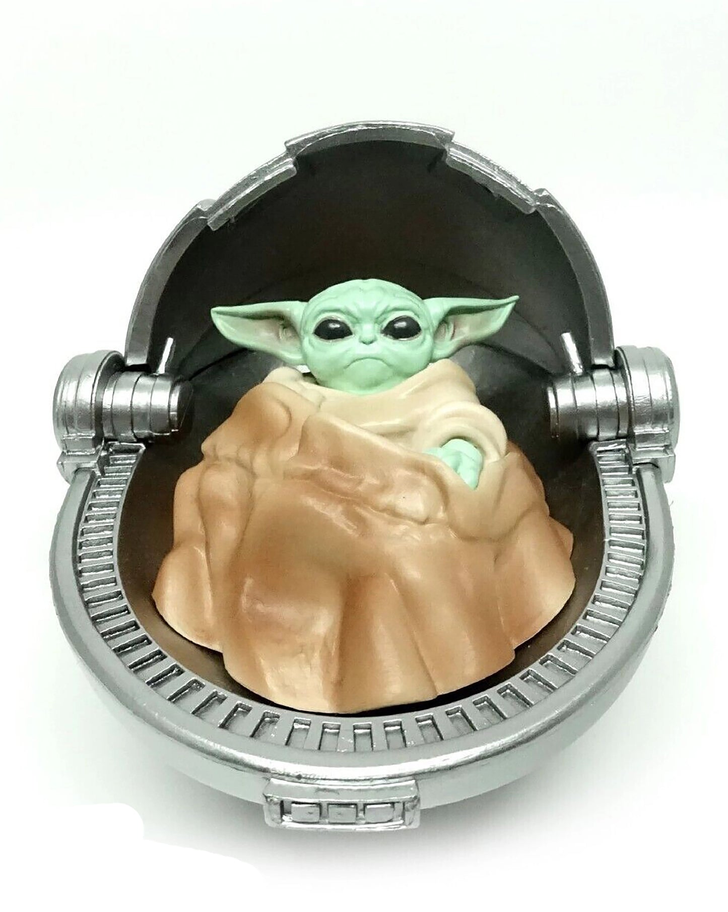 Baby Yoda in rocking Pod