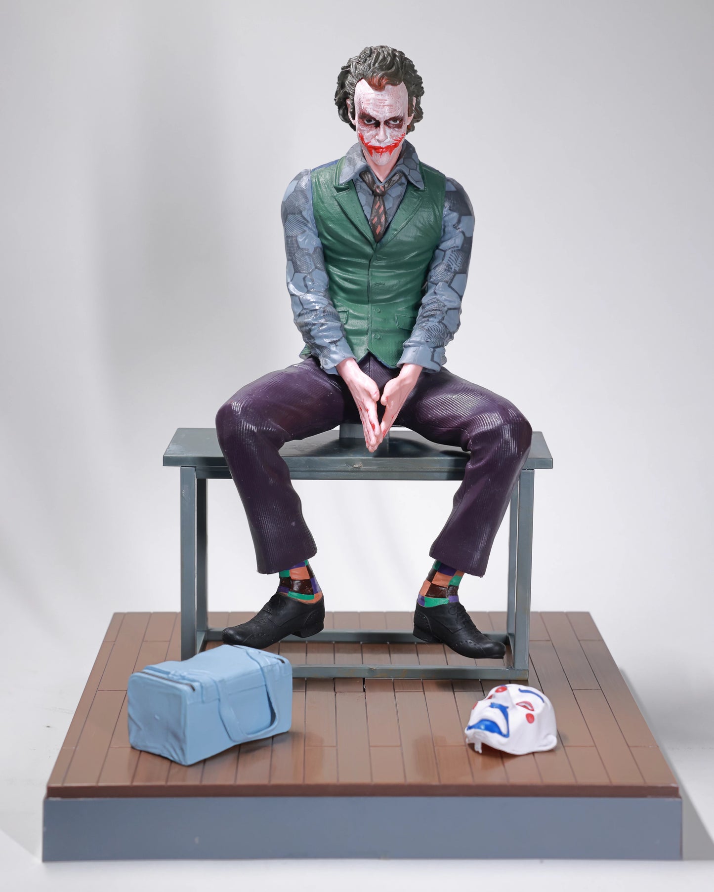 Joker sitting on the bench