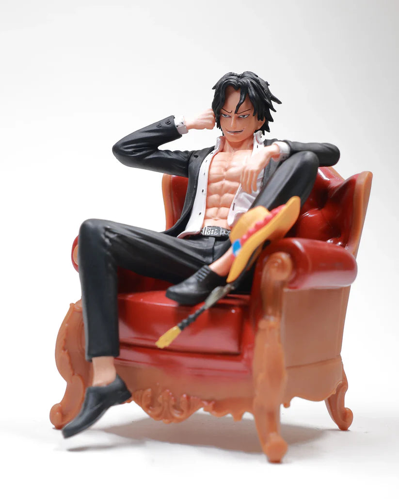 ace sitting in black suit