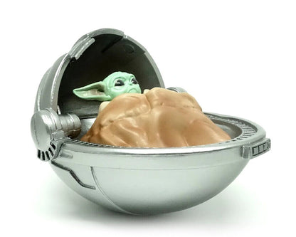 Baby Yoda in rocking Pod
