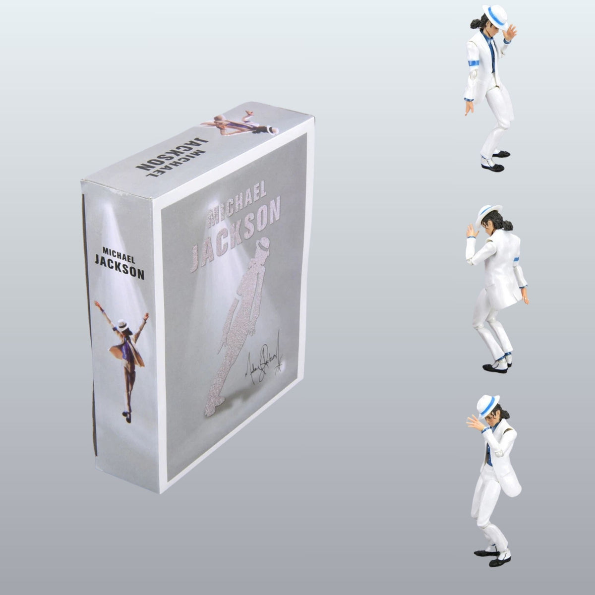 Michael Jackson 'Thrasher' collectible figure set shown with its packaging box on a light gray background. The box features Michael Jackson artwork, and the right side shows three small figures of the figure in different poses wearing a white suit with blue and white striped accents.